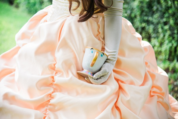 Princess Beauty holding teacup